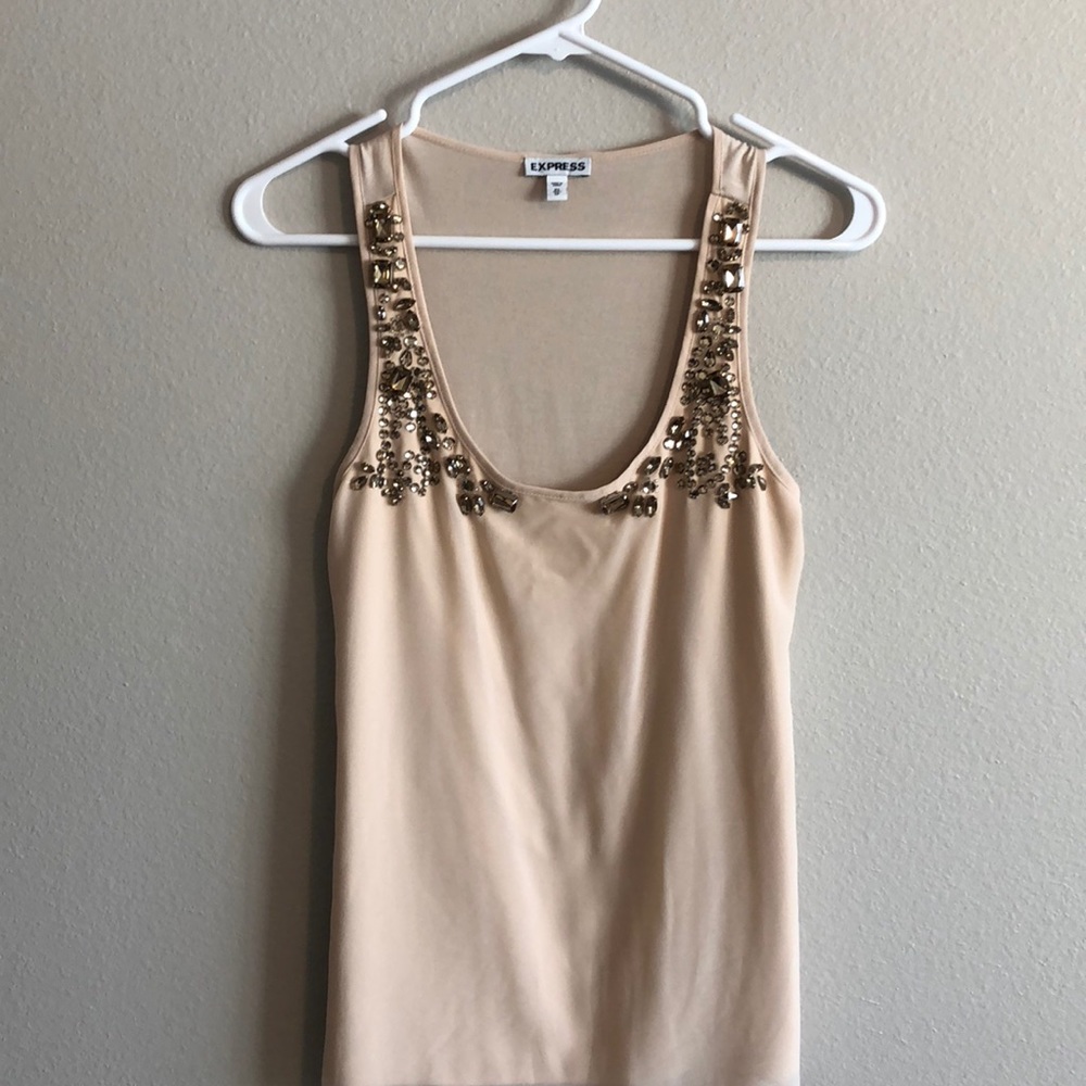 Express jeweled top.